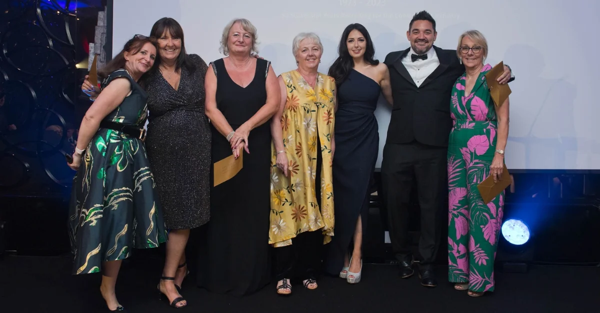 10+ Years Long Service (left to right): Lucy Porter (Compère), Jo Harrington (Guildford), Karen Forrester (Reading), Jane Shults (Head Office Accounts), Charlotte Mullin (Southampton), Chris Booth (Presenting Award), Sally Branagh (Head Office Accounts)