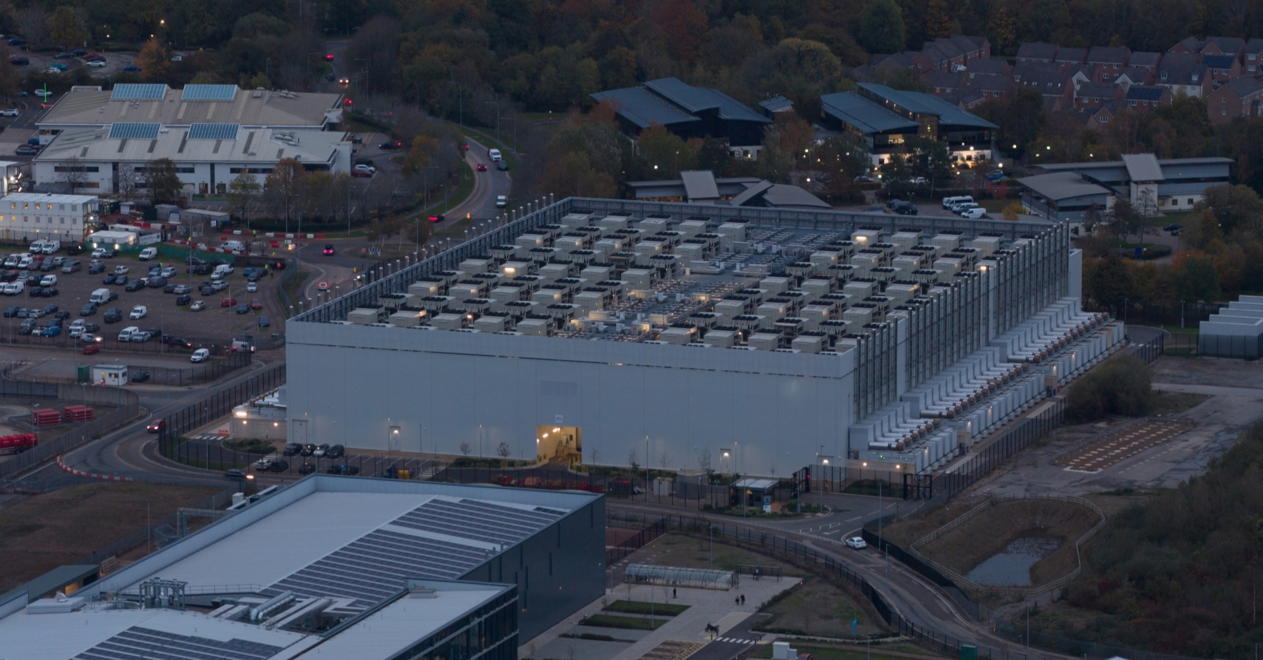 Construction market trends datacentre Large UK data centre facility surrounded by roads and buildings, highlighting growing infrastructure demand in the construction sector