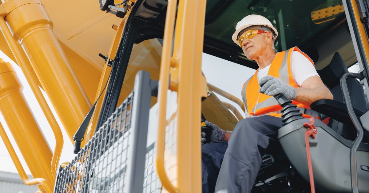 Someone bridges the skills gap by training on heavy construction machinery