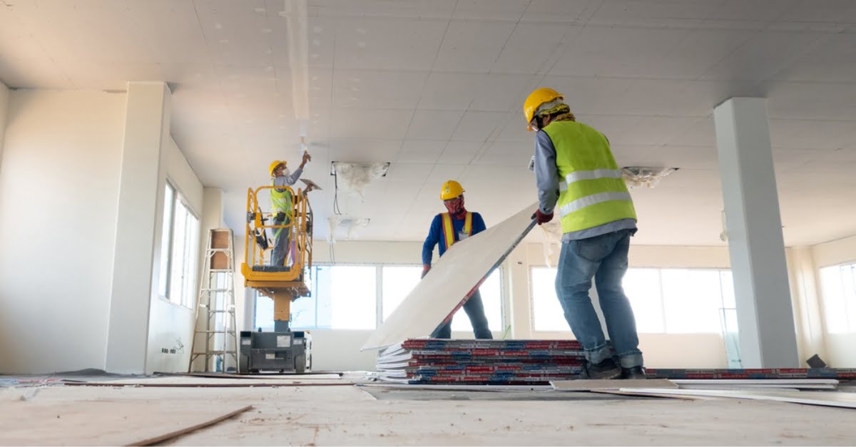 A group of career construction workers operating in a building site