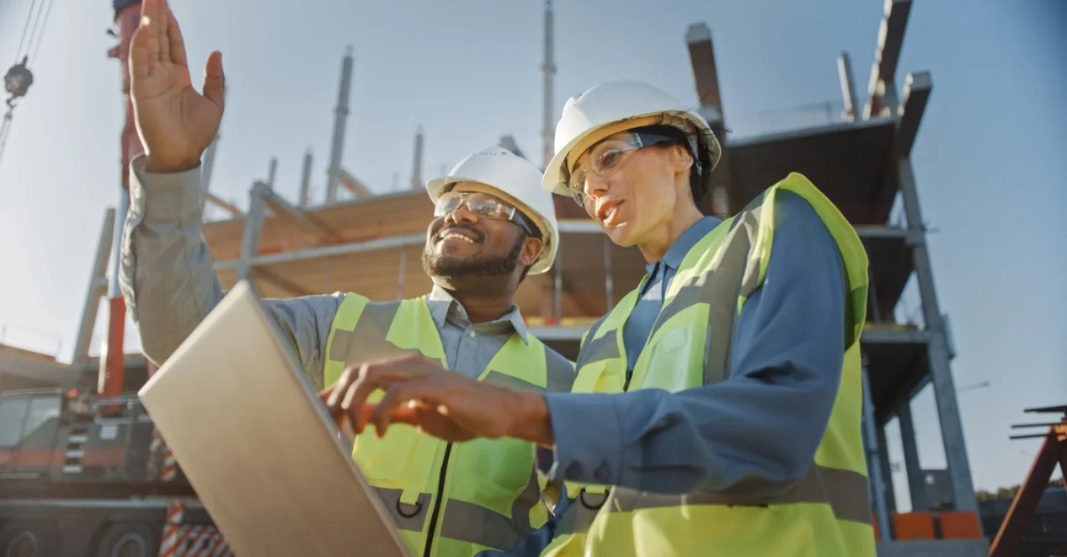 Diverse construction workers outside