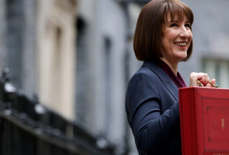 Rachel Reeves, the Chancellor, holding her red box announcing the budget